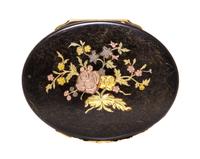 A Georgian Gilt Metal Mounted Snuff Box, 18th/19th Century, of oval form with hinged lid, having floral inlays and banding.