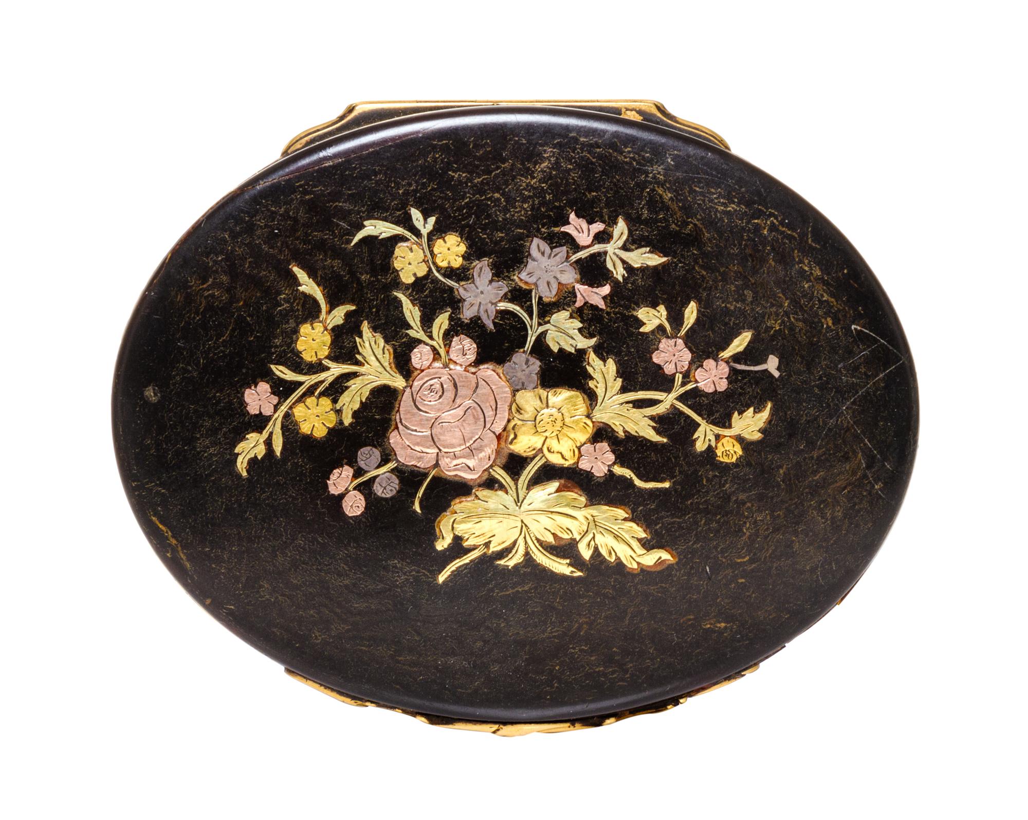 A Georgian Gilt Metal Mounted Snuff Box, 18th/19th Century, of oval form with hinged lid, having floral inlays and banding.