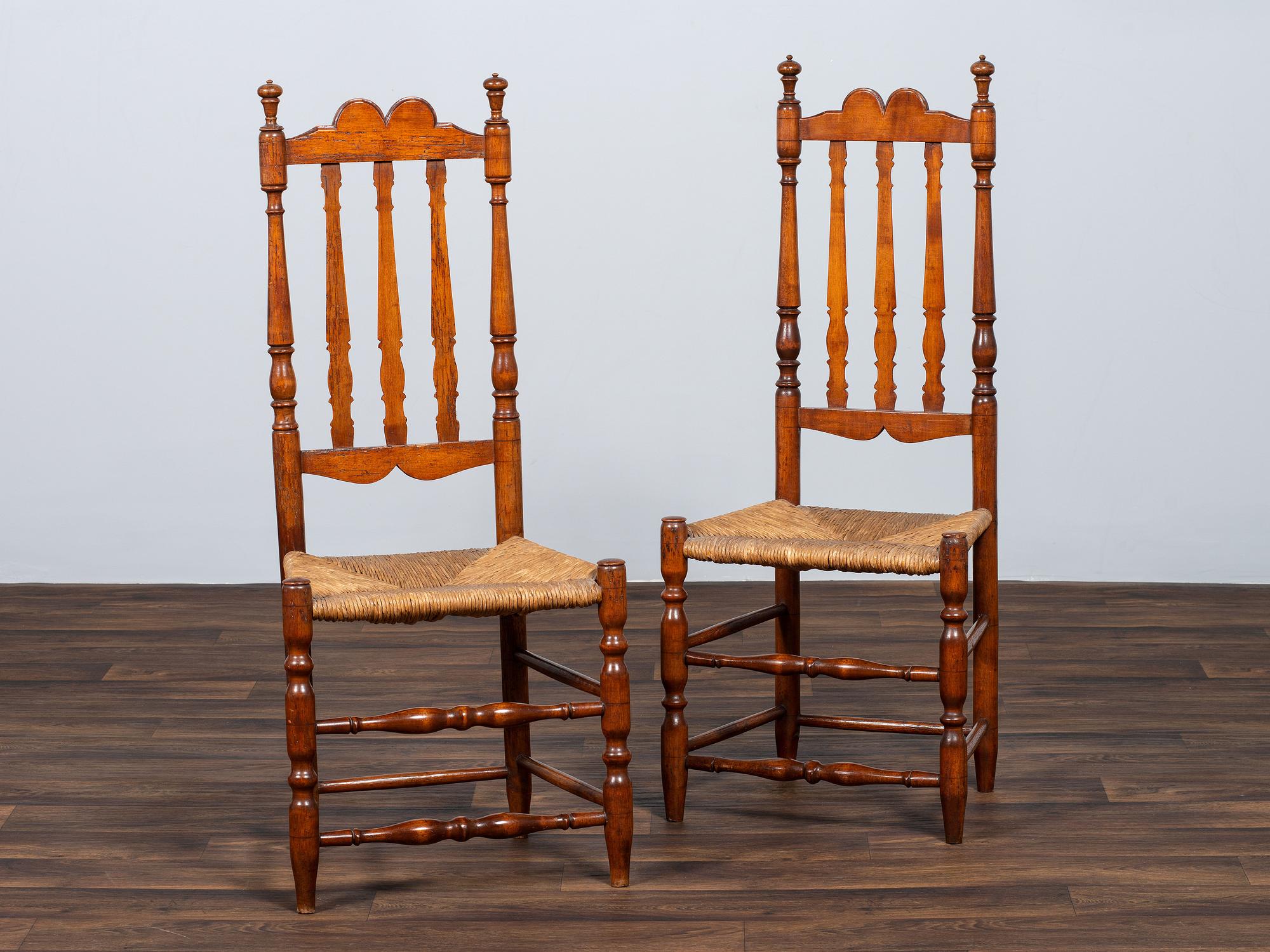 A Pair of William and Mary Bannister-Back Rush Seat Side Chairs