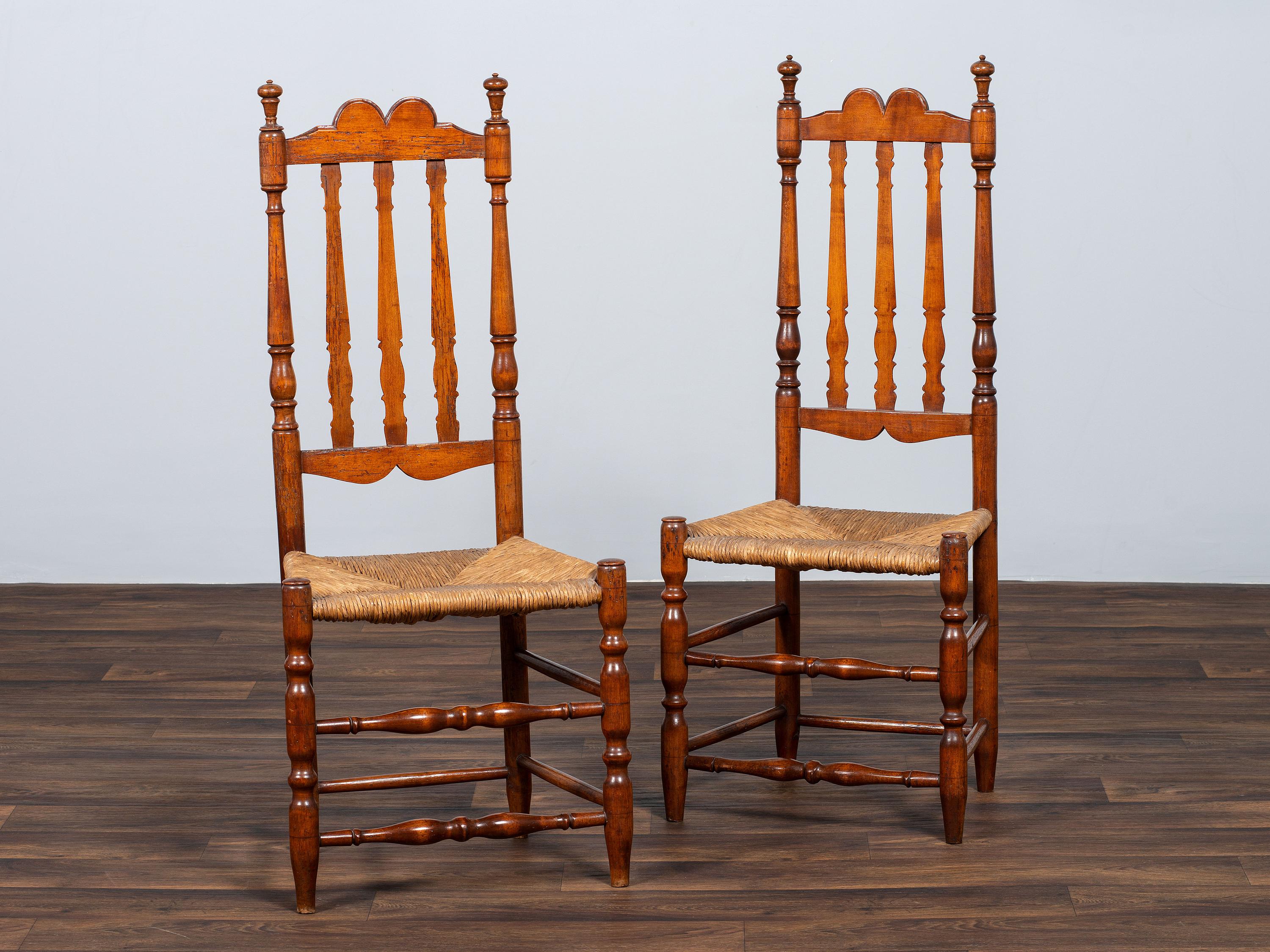 A Pair of William and Mary Bannister-Back Rush Seat Side Chairs