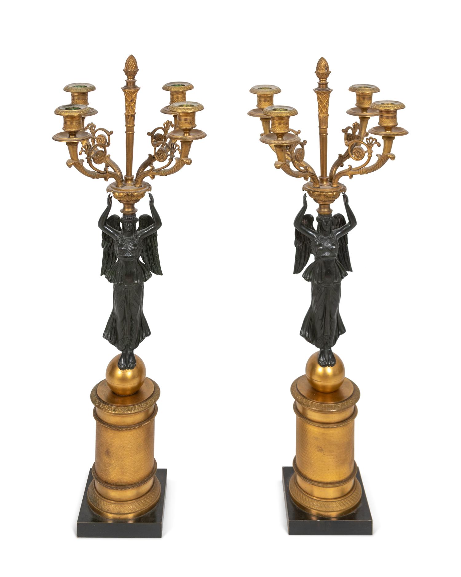 A Pair of Empire Style Parcel-Gilt and Patinated Bronze Four-Light Candelabra