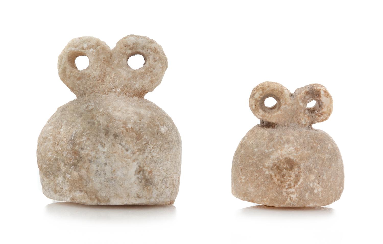Two Syrian Gypsum Spectacle Idols Height of taller 1 5/8 x width 1 3/8 inches. — TELL BRAK, CIRCA 4TH MILLENNIUM B.C.E.