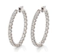 A Pair of 14 Karat White Gold and Diamond Hoop Earrings, 7.85 dwts.