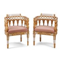 A Pair of Italian Neoclassical Style Painted and Parcel Gilt Armchairs