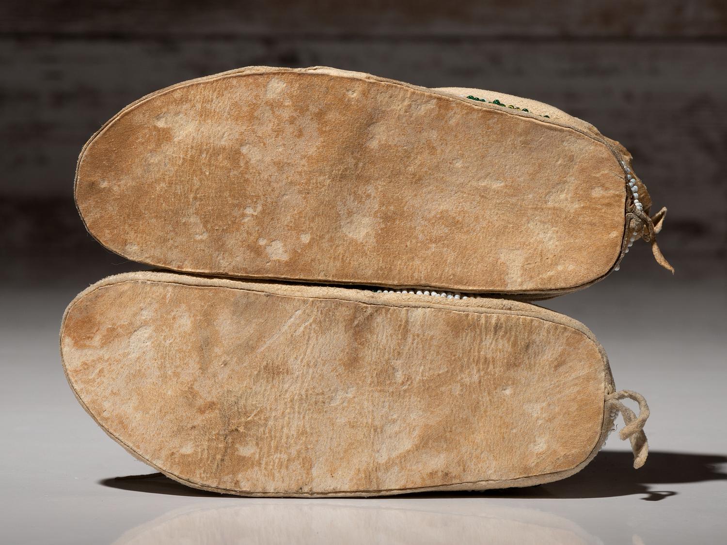 Cheyenne Child's Moccasins and Arapaho Doll Cradle
