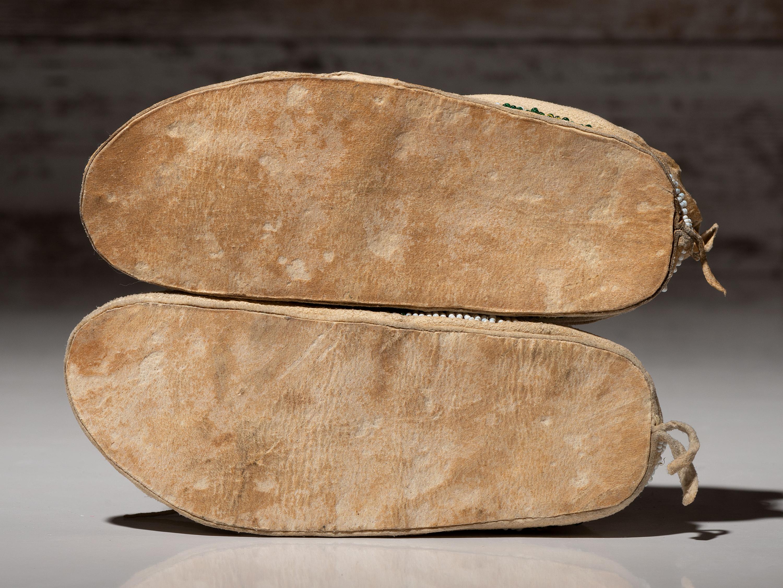 Cheyenne Child's Moccasins and Arapaho Doll Cradle