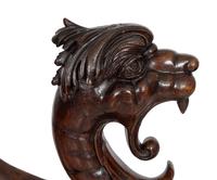 An American Carved Walnut Griffin Newel Figure