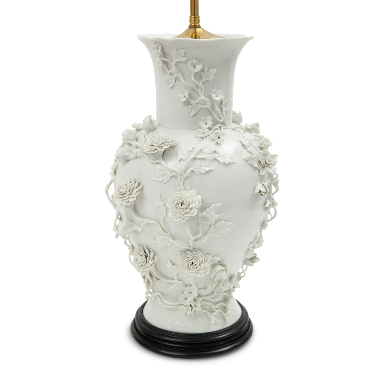 A Pair of Blanc de Chine Floral Porcelain Vases Mounted as Lamps