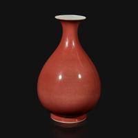 A Chinese copper red-glazed bottle vase Daoguang mark and of the period