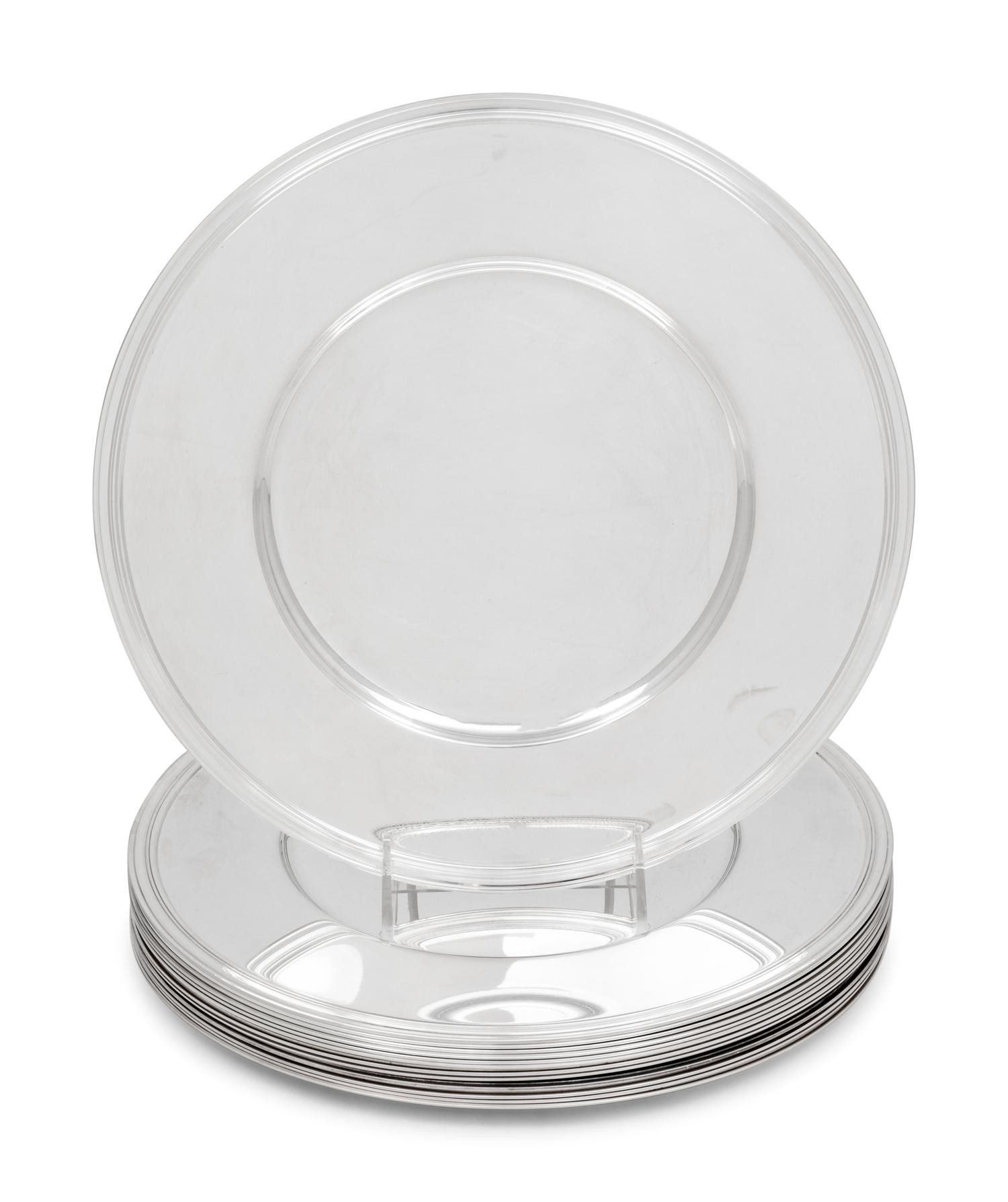 A Set of Thirteen Christofle Silver-Plate Chargers