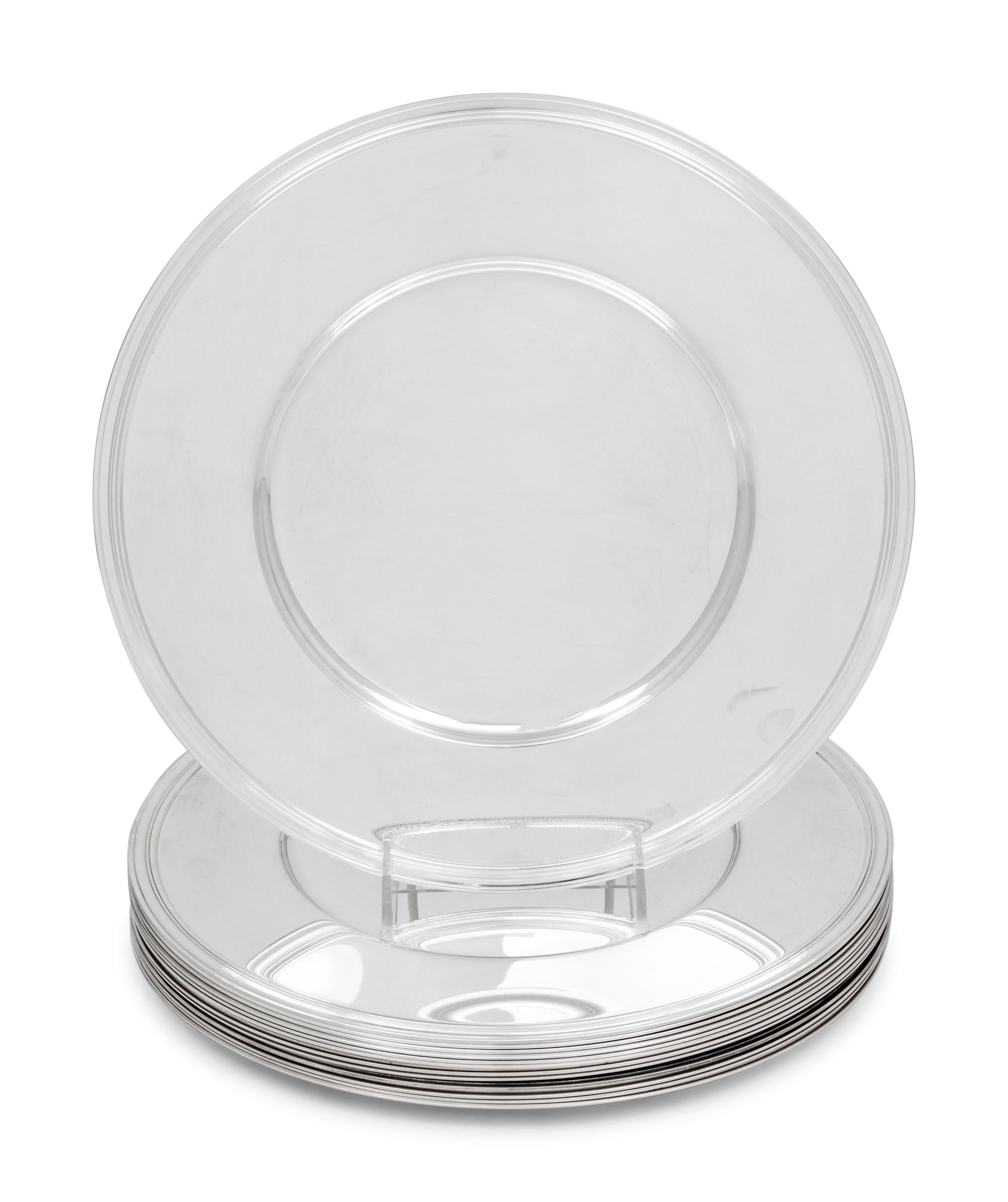 A Set of Thirteen Christofle Silver-Plate Chargers