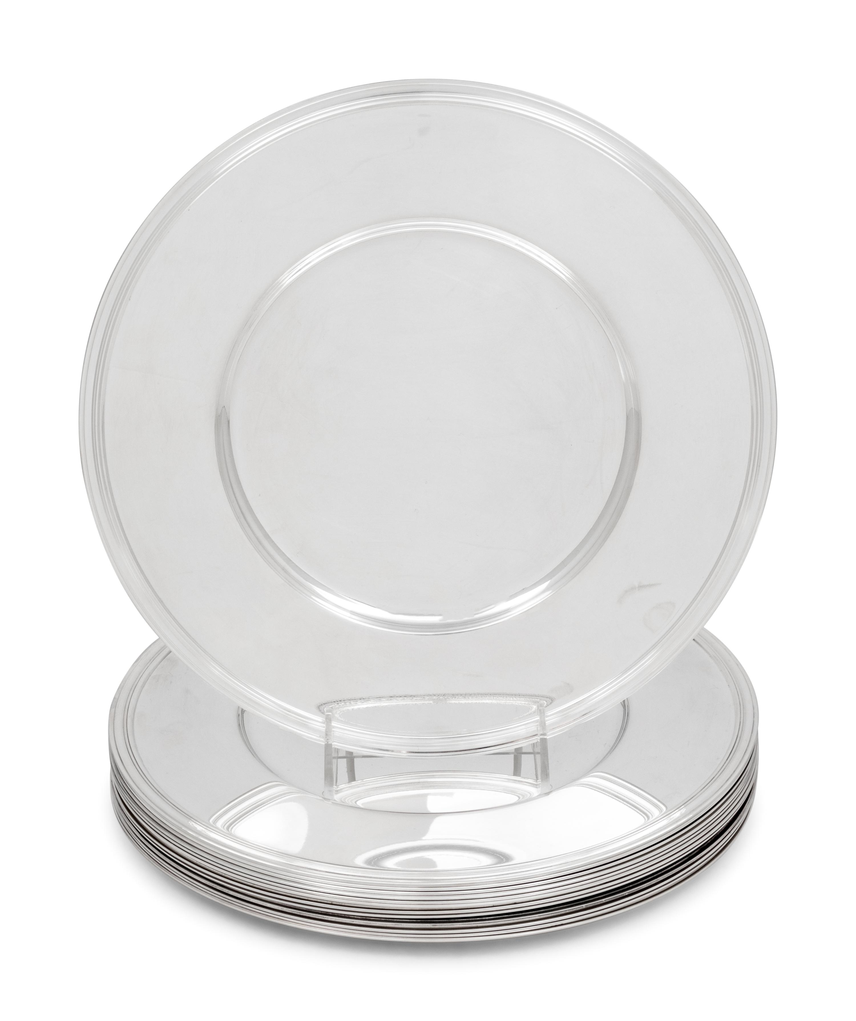 A Set of Thirteen Christofle Silver-Plate Chargers