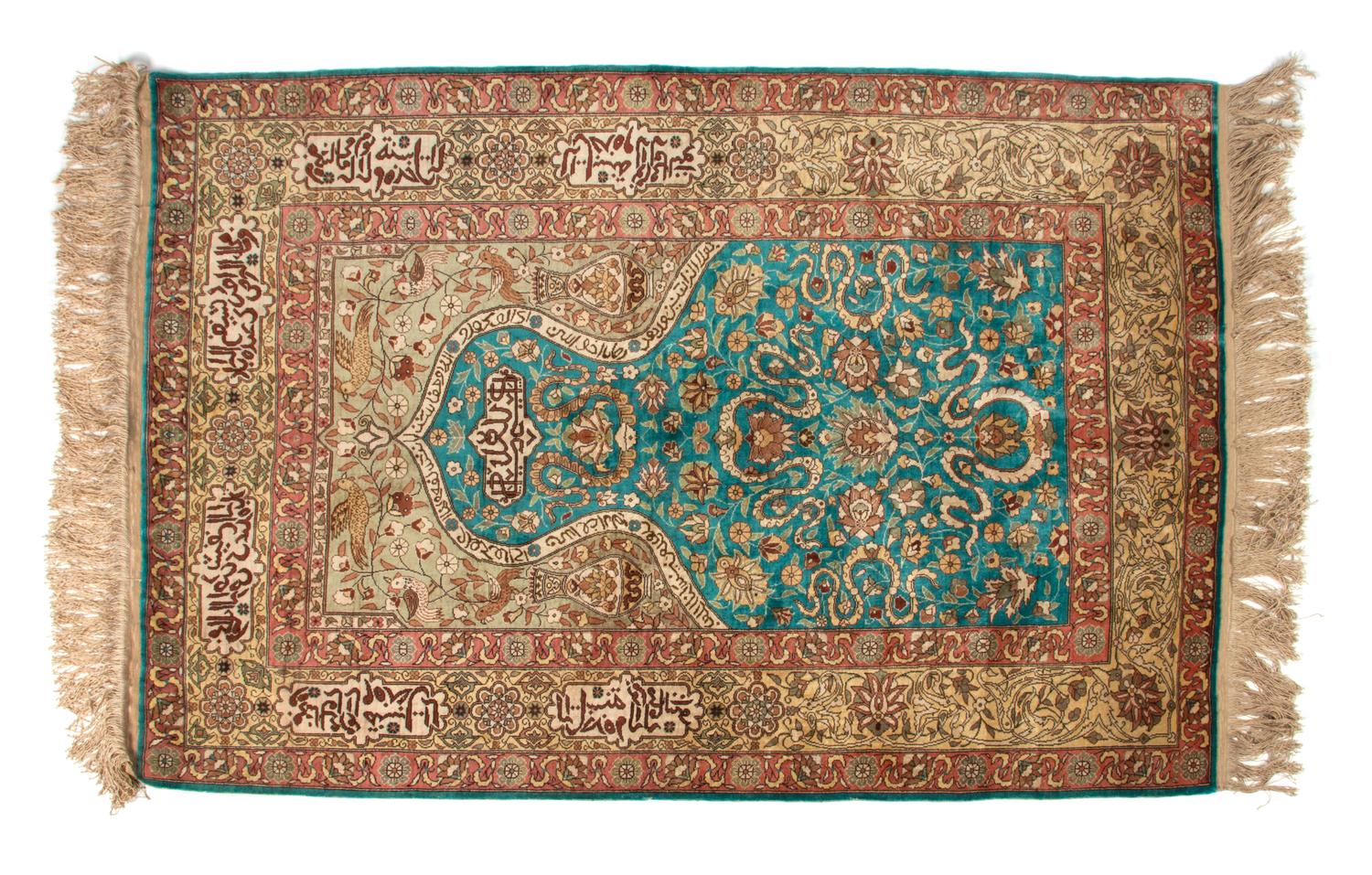A Persian Silk and Wool Prayer Rug 4 feet 8 inches x 3 feet 2 inches.
