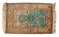 A Persian Silk and Wool Prayer Rug 4 feet 8 inches x 3 feet 2 inches.