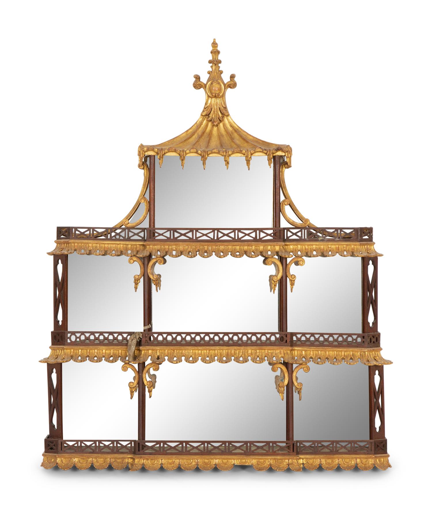 A George III Style Pierce Carved and Parcel Gilt Mahogany and Mirror Glass Pagoda-Form Hanging Étagère