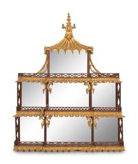 A George III Style Pierce Carved and Parcel Gilt Mahogany and Mirror Glass Pagoda-Form Hanging Étagère