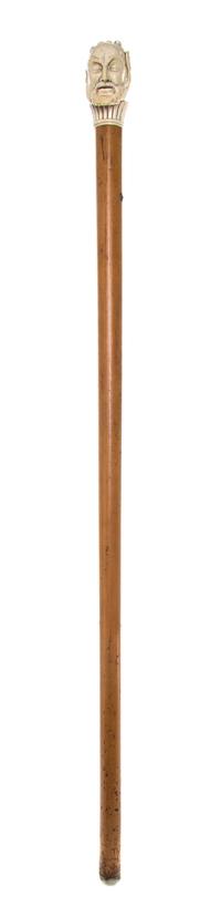 An English Ivory Handled Walking Stick, Length of handle 3 1/2 x length overall 36 7/8 inches.