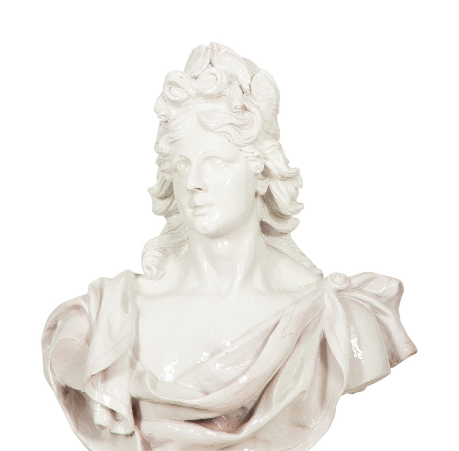 A Pair of Italian White Glazed Ceramic Busts on Pedestal Bases