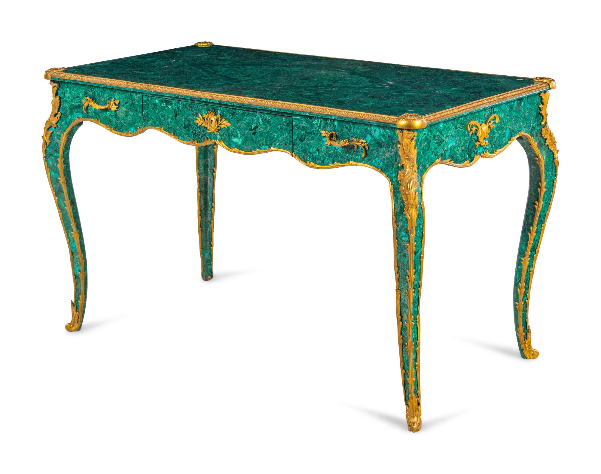 A Louis XV Style Gilt Bronze Mounted Malachite Veneered Bureau Plat