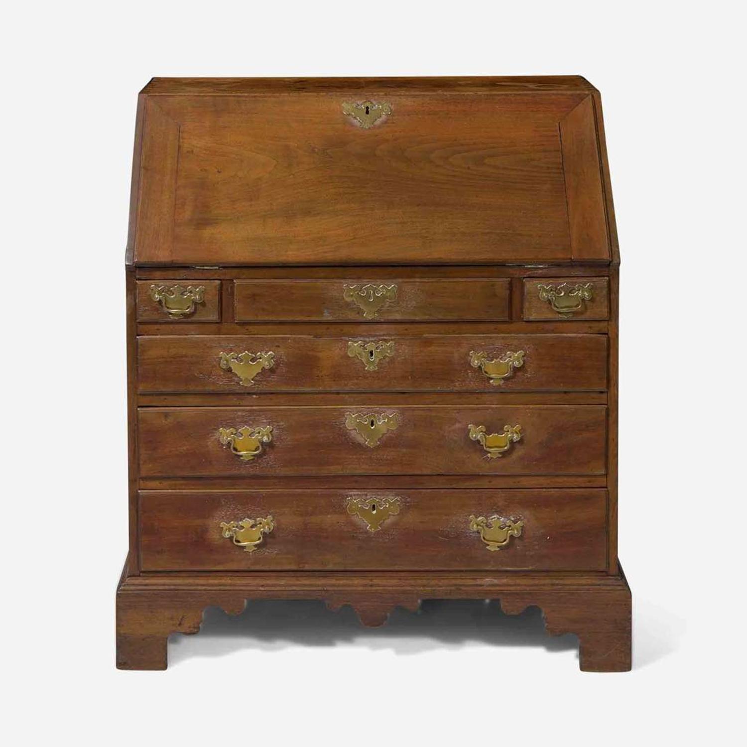 A Chippendale carved walnut slant-front desk Probably Pennsylvania, 18th century