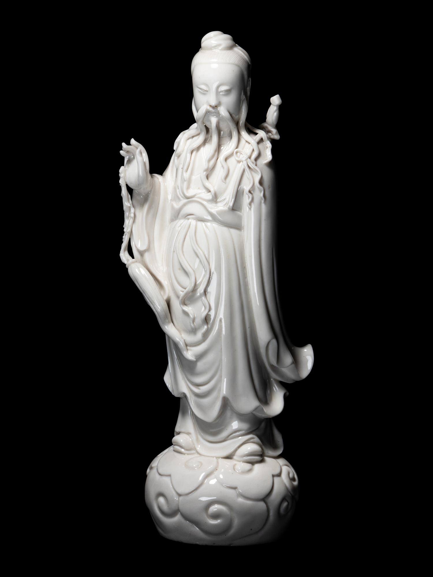 A Blanc-de Chine Porcelain Figure of a Daoist Immortal