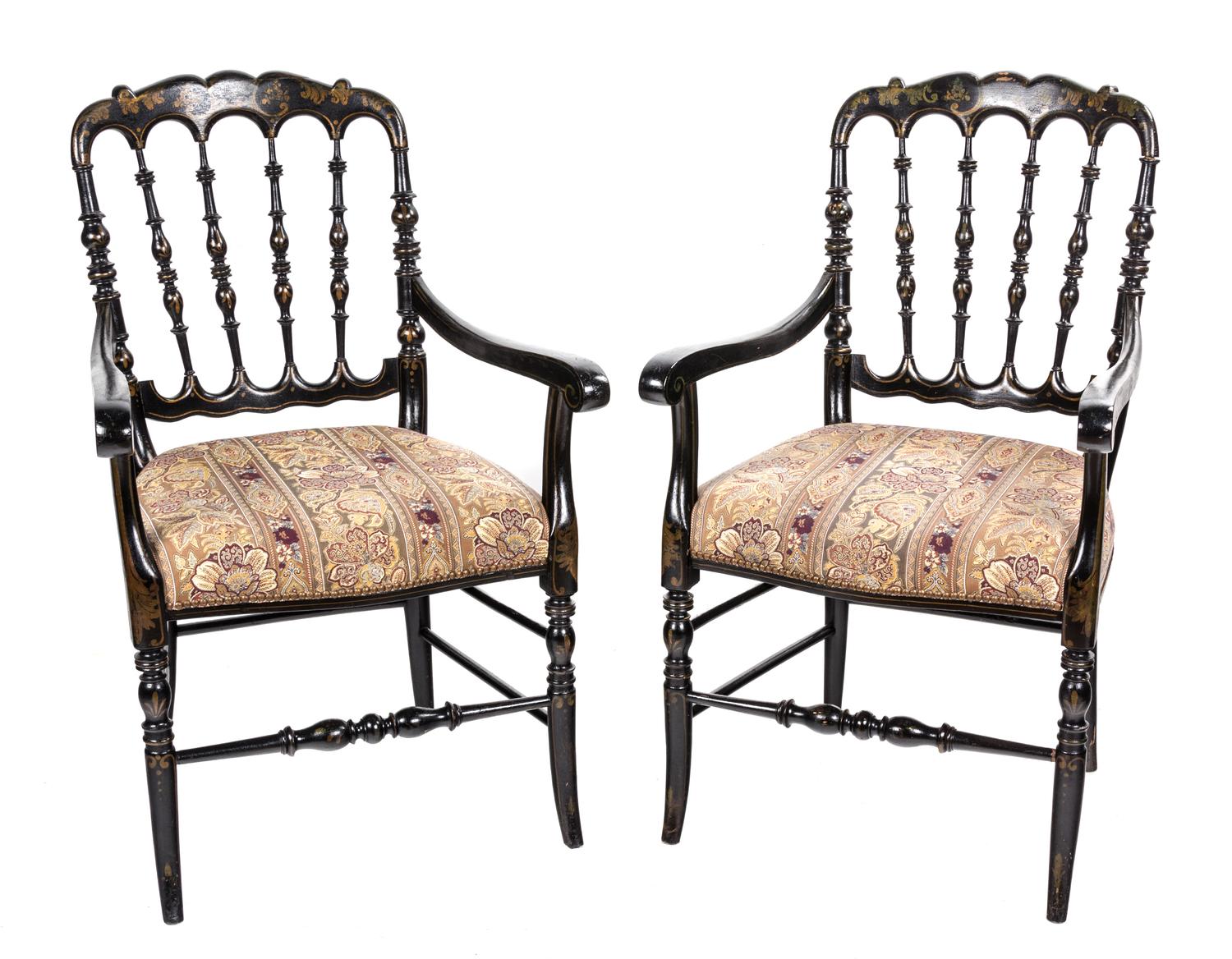 A Pair of Victorian Black and Gilt Painted Armchairs Height 36 inches.