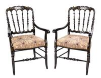 A Pair of Victorian Black and Gilt Painted Armchairs Height 36 inches.