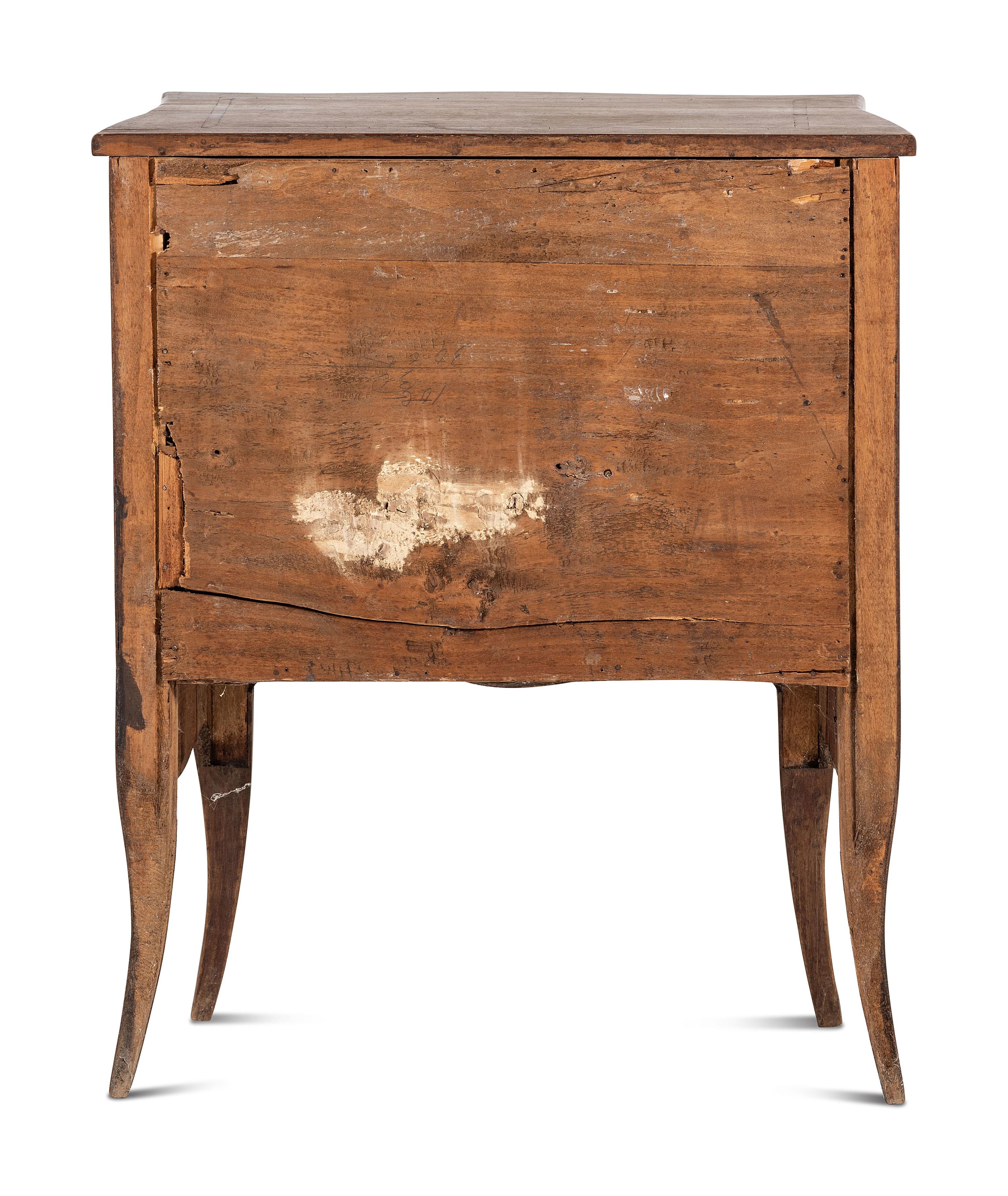 An Inlaid Walnut Commode