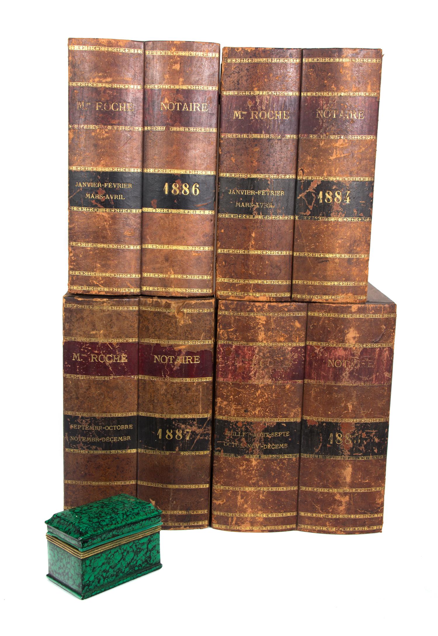 Four Leather Bound Book-Form Boxes Height of malachite box 3 3/4 inches.