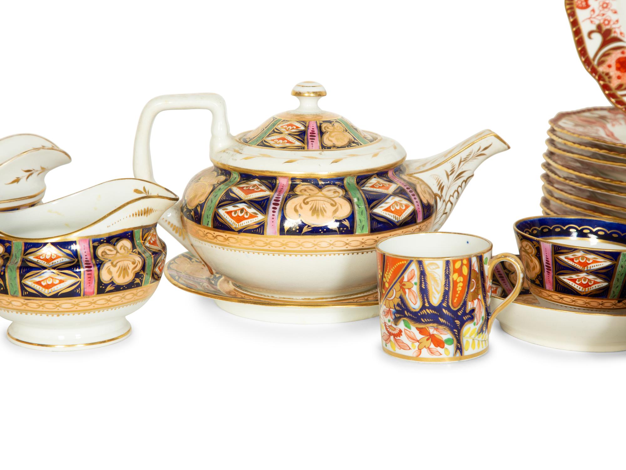 A Set of Twelve Royal Crown Derby Porcelain Plates