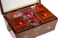 A Regency Brass Inlaid Tulipwood Tea Poy