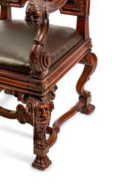 An Italian Baroque Style Leather-Upholstered Carved Walnut Armchair — 19TH CENTURY