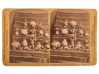 [NATIVE AMERICANS]. BENNETT, G.C., photographer. Indian Pottery, Navajo Blanket Background . Santa Fe, NM: ca 1870s.