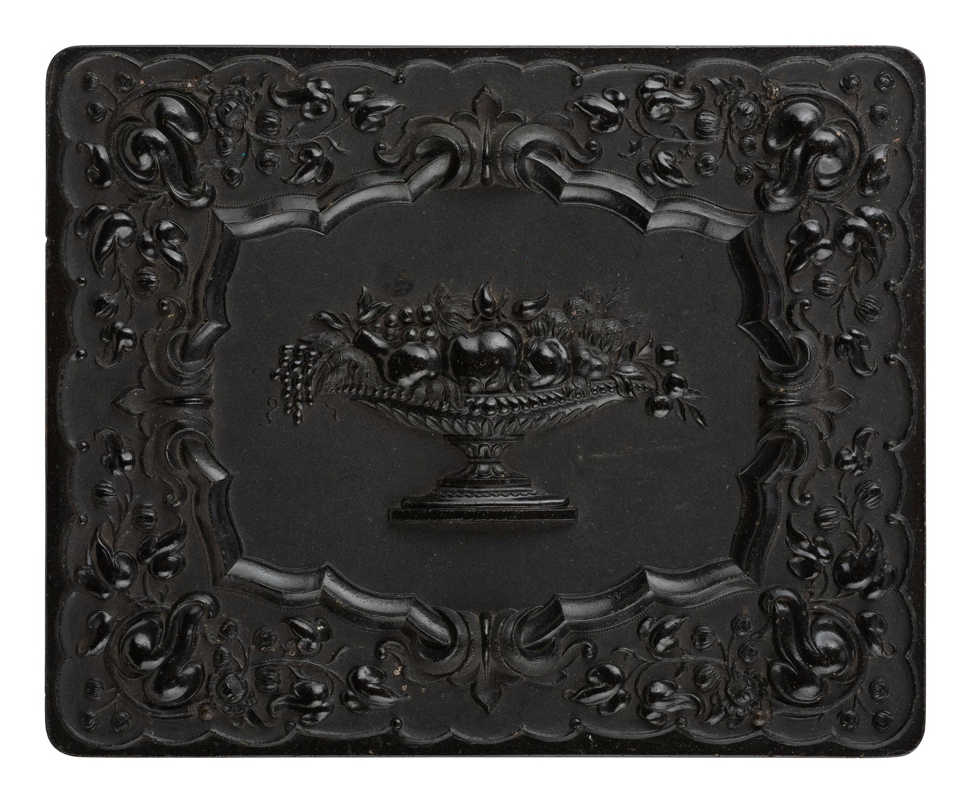 [EARLY PHOTOGRAPHY]. Half plate daguerreotype featuring a gentleman and his sleeping canine companion.