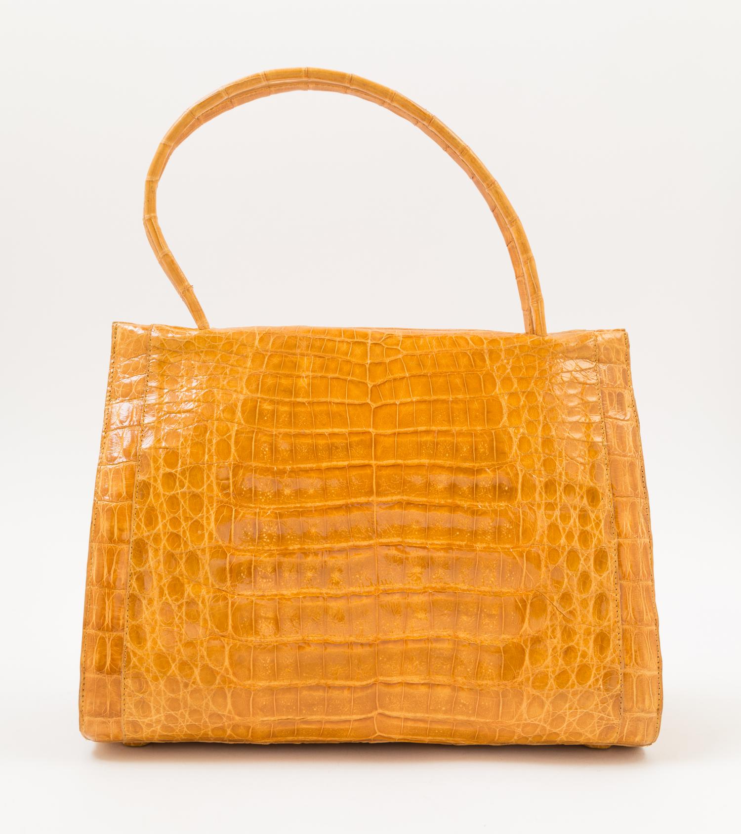 A Nancy Gonzalez Yellow Columbian Crocodile Handbag, 11" x 9" x 4.25"; Handle drop: 5.5".