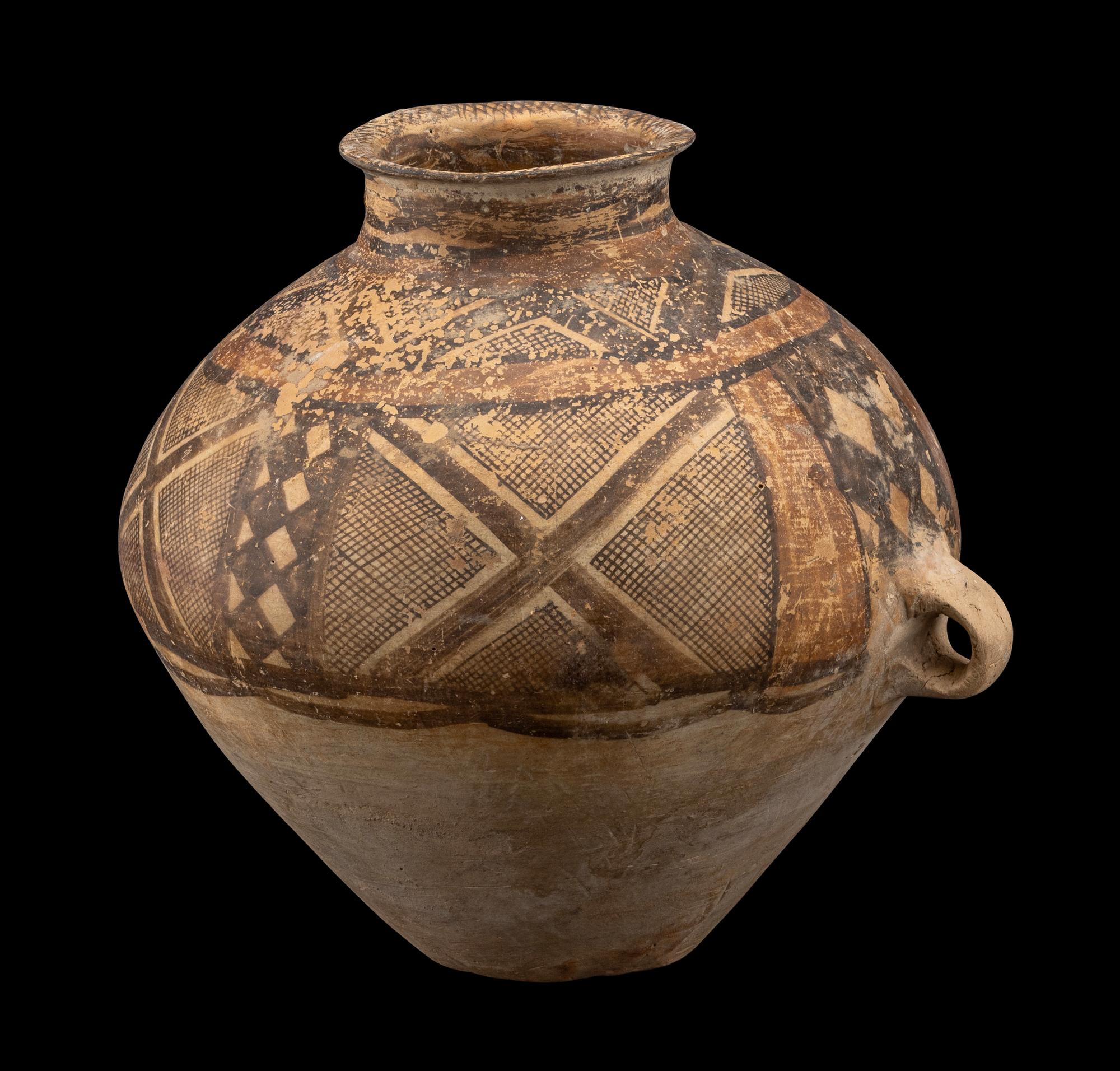 A Chinese Painted Pottery Handled Jar