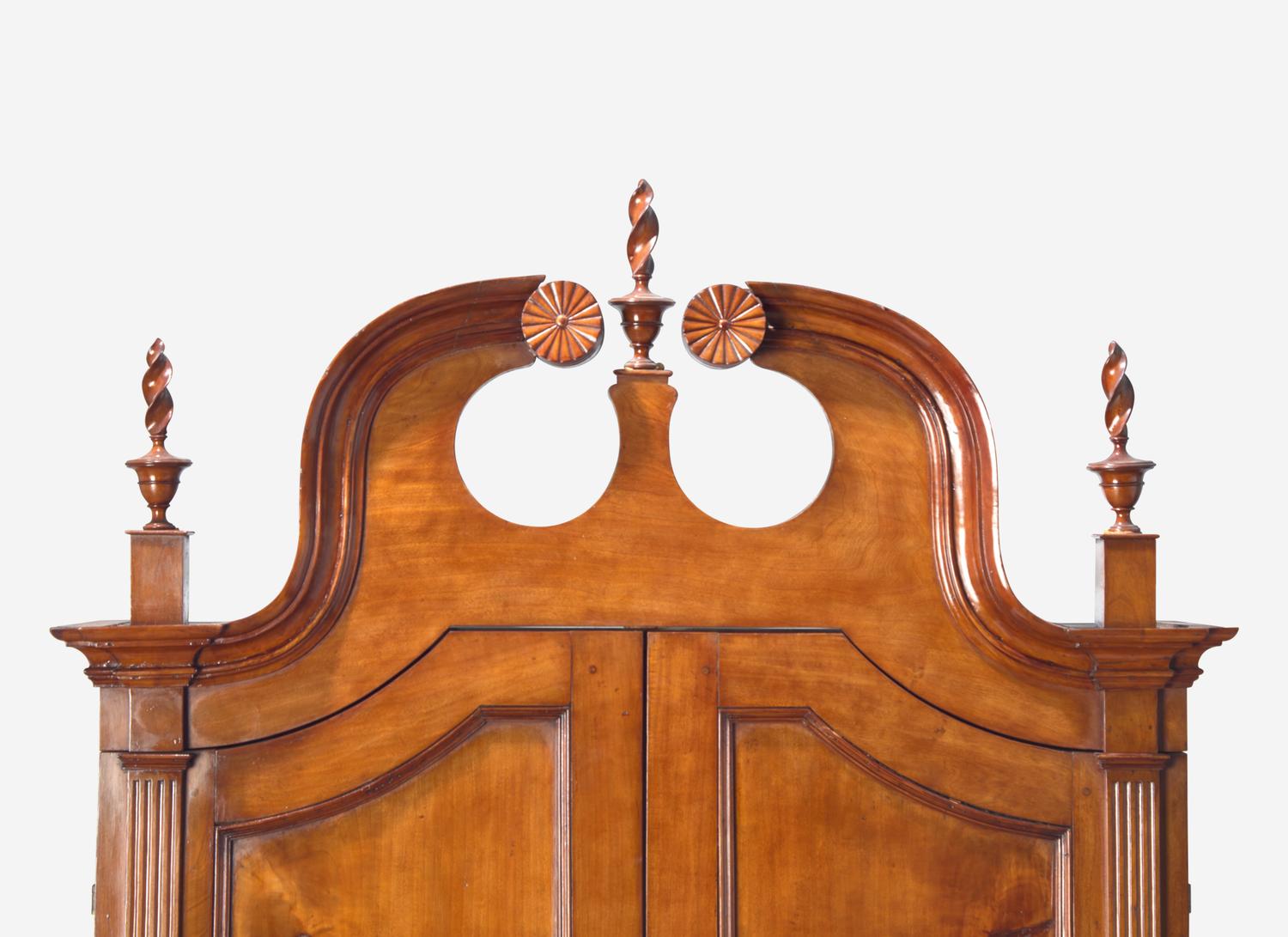 A Chippendale Carved Cherrywood Desk and Bookcase