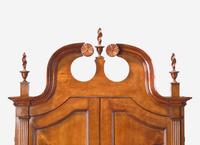 A Chippendale Carved Cherrywood Desk and Bookcase