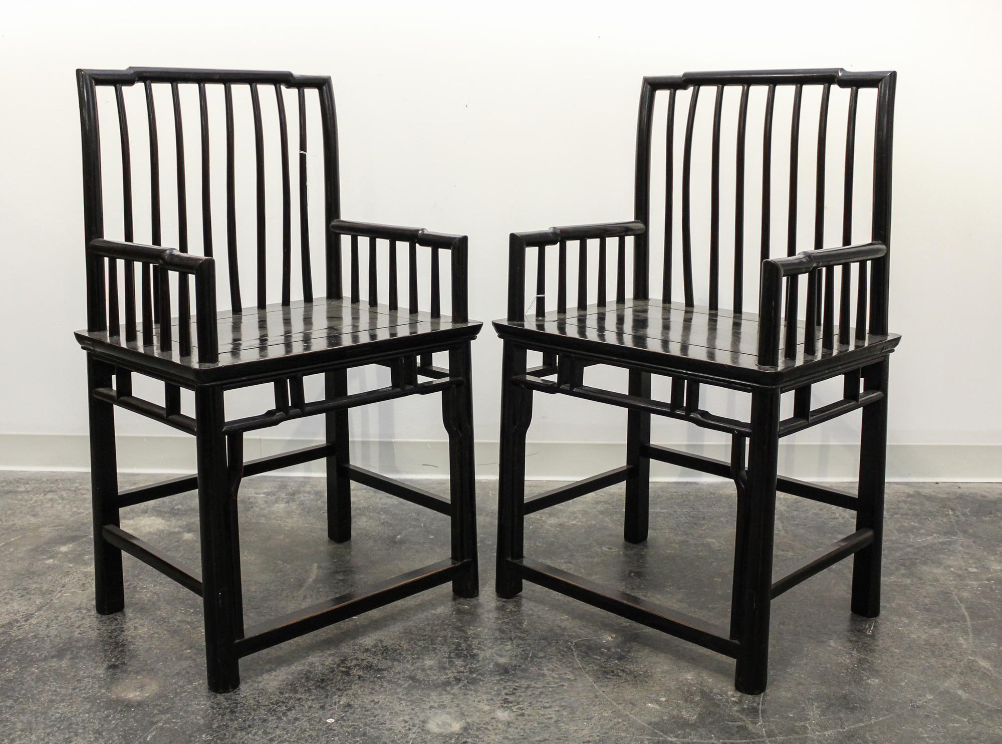 A Pair of Chinese Lacquered Chairs. Height 39 1/4 x width 23 1/2 inches.