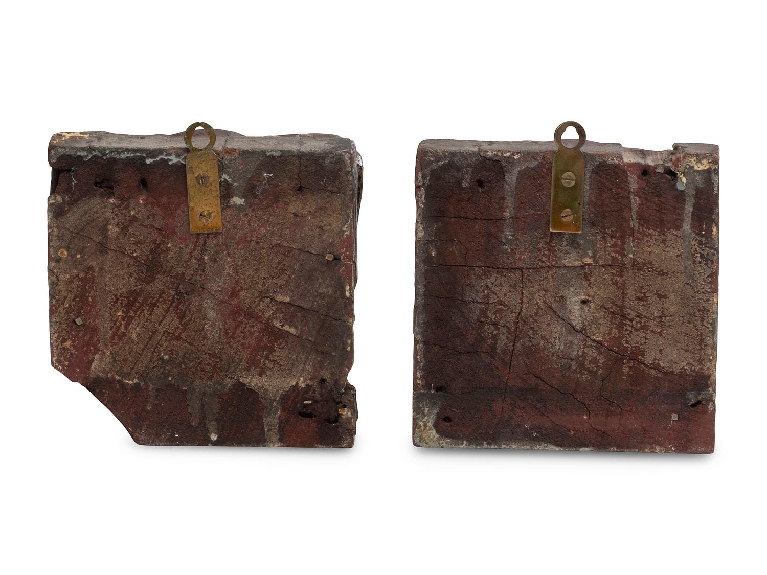 A Pair of Carved Walnut Dog-Form Wall Mounts