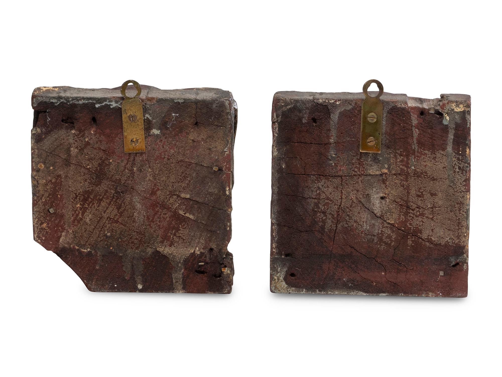 A Pair of Carved Walnut Dog-Form Wall Mounts