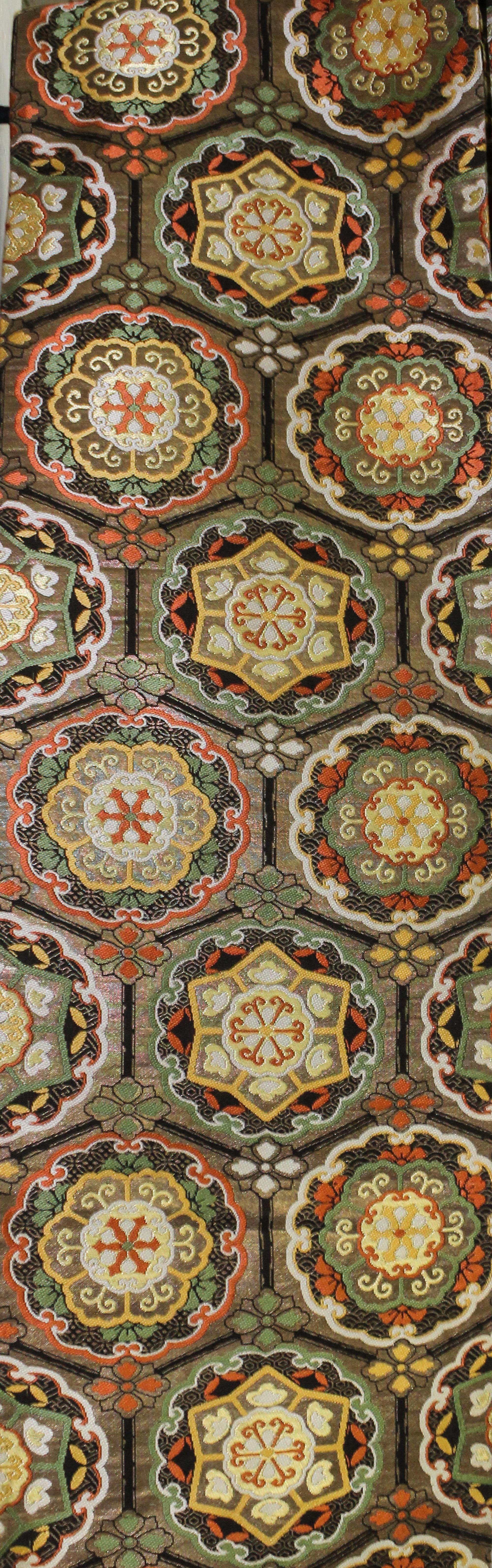 A Chinese Silk Brocade Cloth. Length 155 inches.