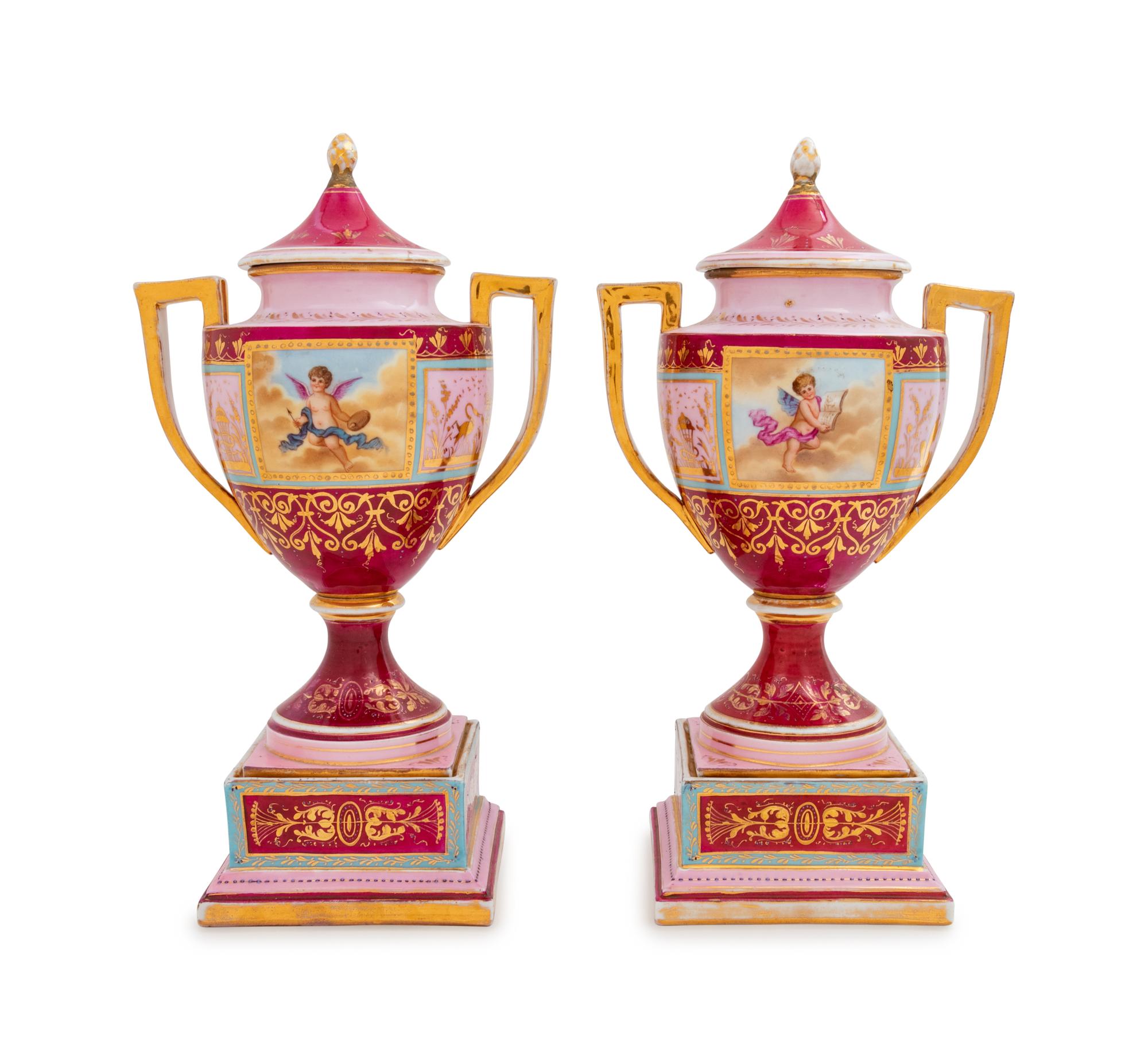 A Pair of Vienna Painted Porcelain Covered Urns and Stands
