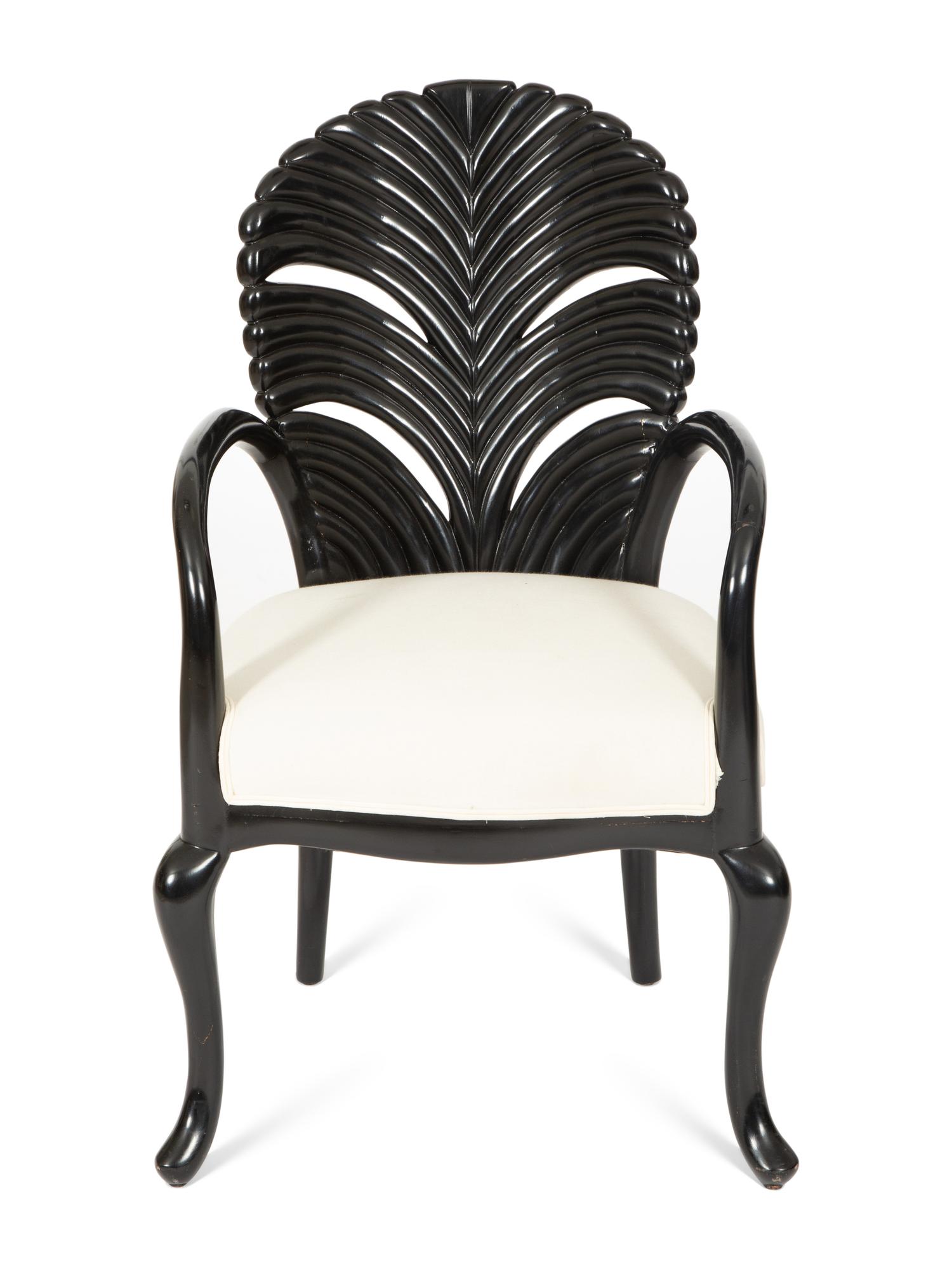 A Venetian Grotto Style Carved Black Lacquered Armchair
