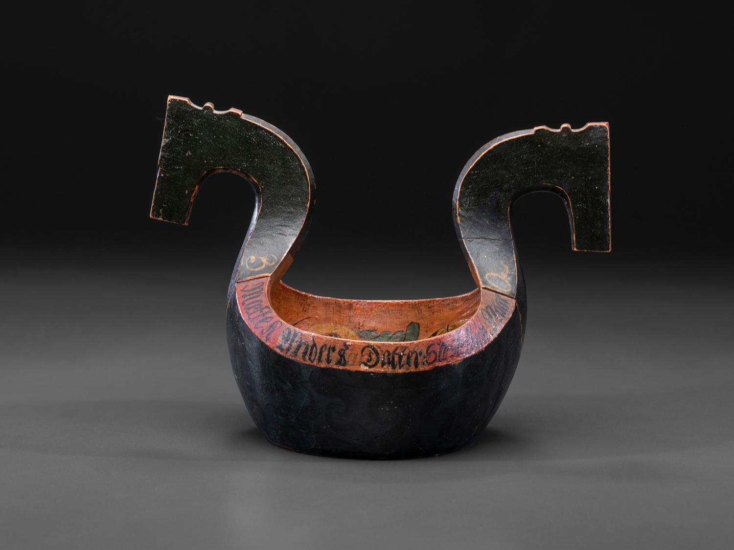 A Scandinavian Carved and Painted Wood Ale Bowl