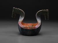 A Scandinavian Carved and Painted Wood Ale Bowl