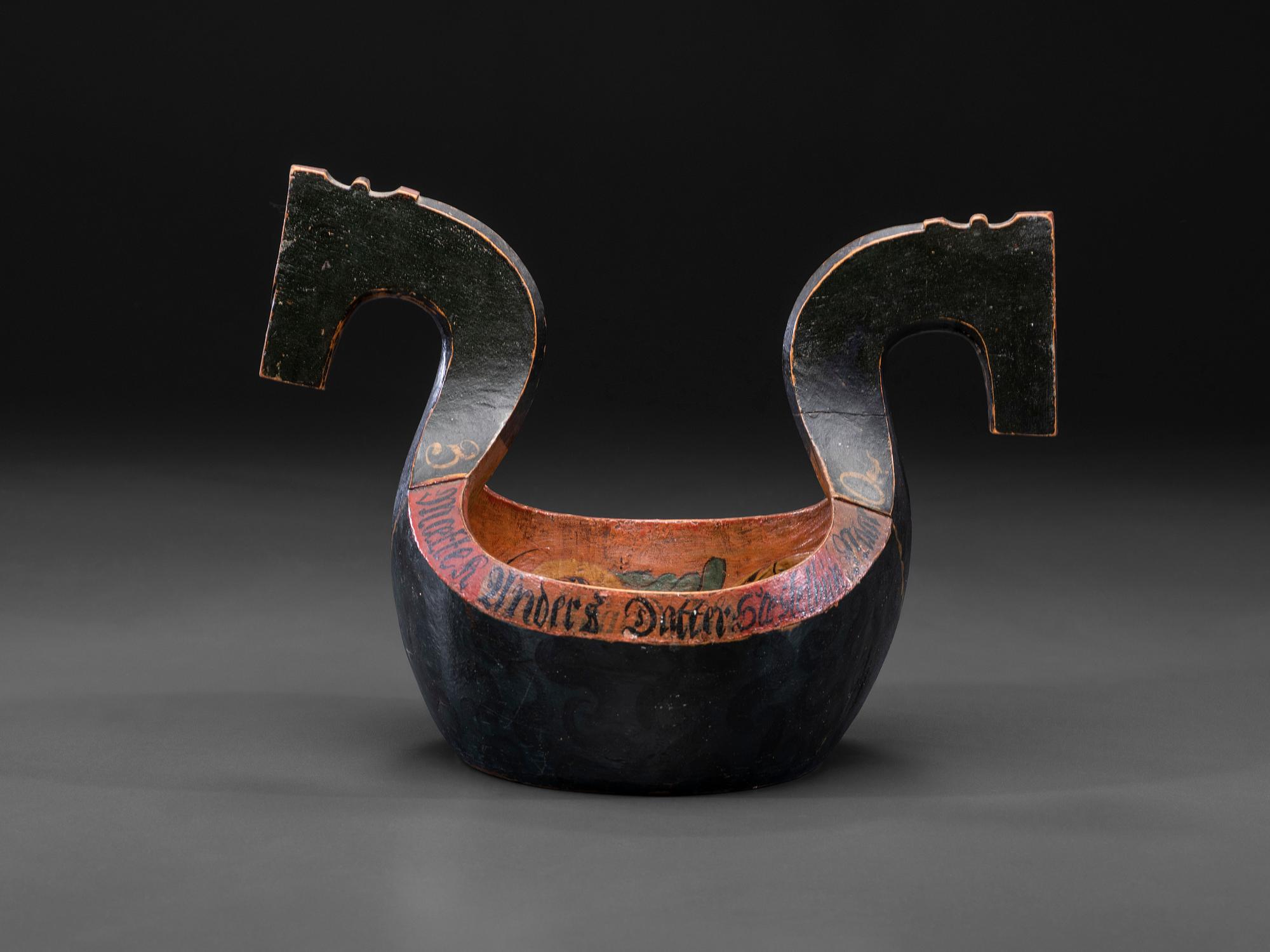 A Scandinavian Carved and Painted Wood Ale Bowl