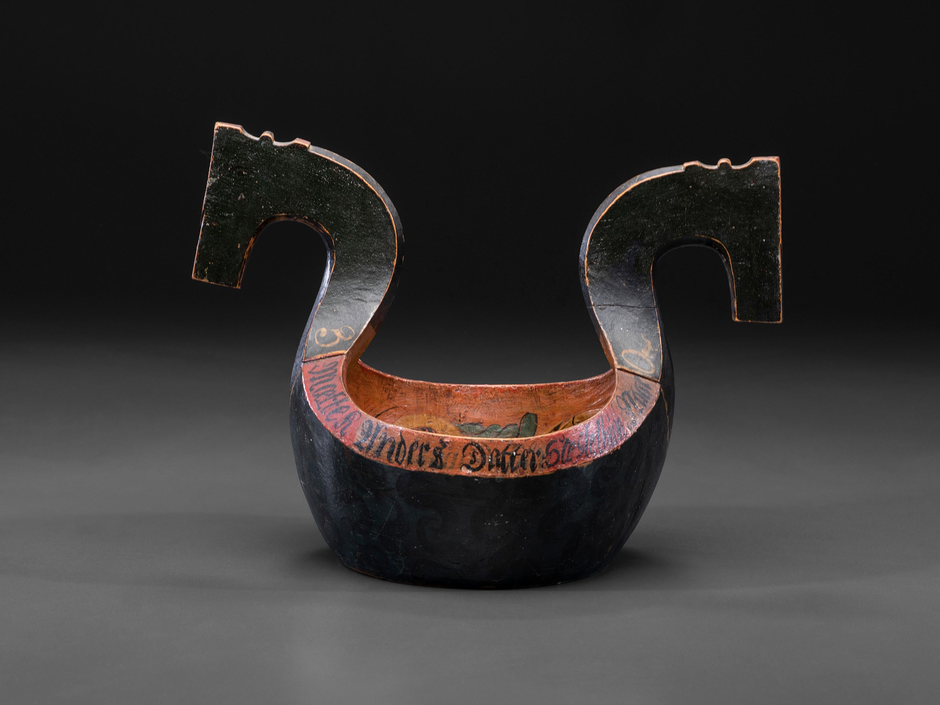 A Scandinavian Carved and Painted Wood Ale Bowl