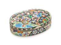 A Russian Enameled Silver Snuff Box, Mark of the 6th Artel, Moscow, Early 20th Century, of oval form, having polychrome enameled foliat