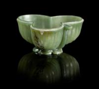 A Chinese Mughal Jade Lobed Cup 17TH/18TH CENTURY Height 1 x width 2 1/4 inches. — 17TH/18TH CENTURY